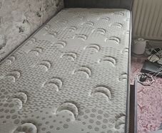 single bed and headboard