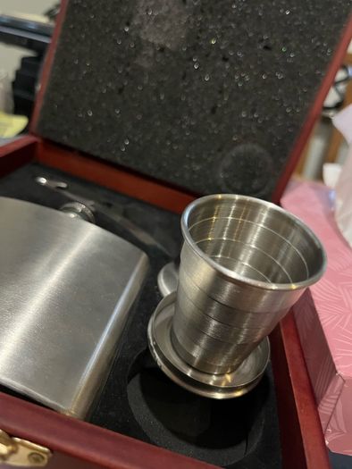 Drinks flask cups and cork screw