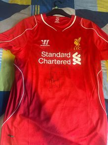 Liverpool jersey signed by Gerrard and Carragher