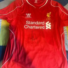 Liverpool jersey signed by Gerrard and Carragher