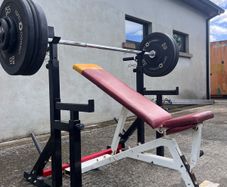 Gym equipment (squat rack/ bench / barbell + weights)