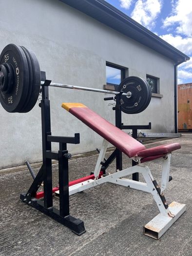 Gym equipment (squat rack/ bench / barbell + weights)