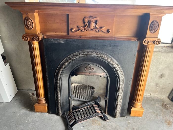 Fireplace cast iron insert wooden surround