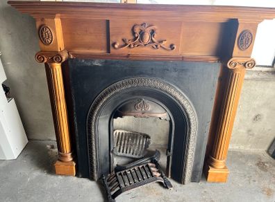 Fireplace cast iron insert wooden surround