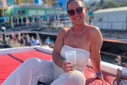 cream trousers and swimsuit