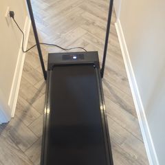 Walking pad with hand rail