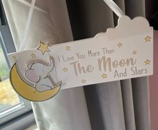 Nursery decor hanging plaque and ornament.