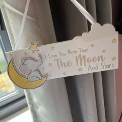 Nursery decor hanging plaque and ornament.