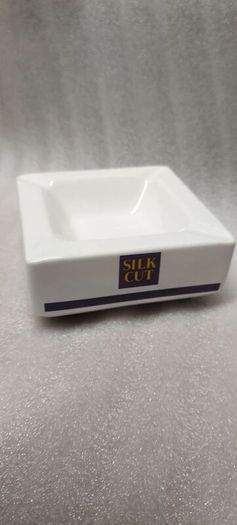 Silk Cut square ashtray ,collectors item, with smoking bans advertising bans on ashtrays for health reasons, price includes post to anywhere in Ireland thank you,,see pictures for condition ,take as is,litte pitting on glaze ,sold as is.