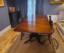 Mahogany Extendable Dining Table with Brass Castors