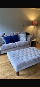 sofa and foot stool