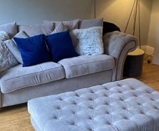 sofa and foot stool