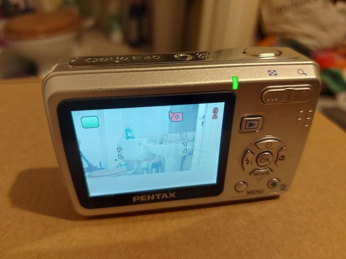 Pentax Optio E40, 8.1 megapixels, Takes 2 AA Batteries, working great and in excellent cosmetic condition