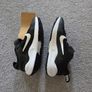 Kids size 7.5 UK Nike revolution 7 black and white trainers Image 2