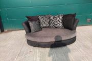 Semi circular gray corner sofa