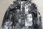 NEW.boy's rain jacket. Age 7/8