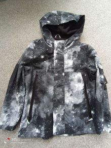 NEW.boy's rain jacket. Age 7/8