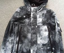 NEW.boy's rain jacket. Age 7/8