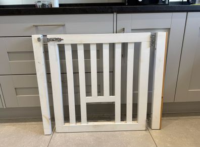 White wooden stair gate