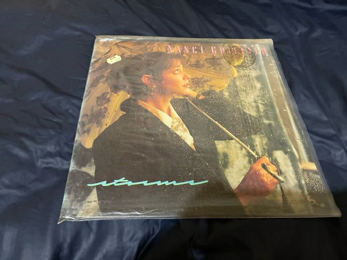 A Nanci Griffith record collection.