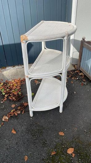 White wicker shelving unit