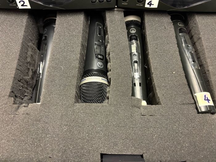 AKG radio microphone system:  4 x AKG HT 470 D Band 10 microphones with 4 x AKG SR470