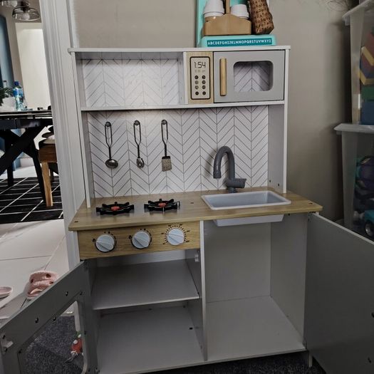 toy kitchen and coffee machine