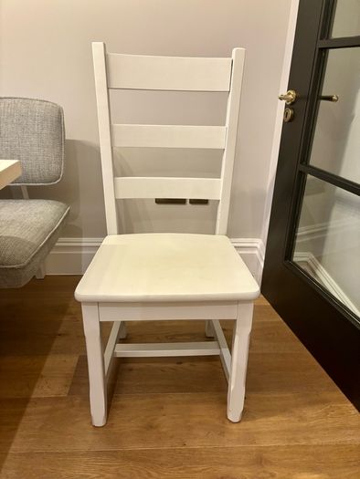 Six solid wood dining chairs