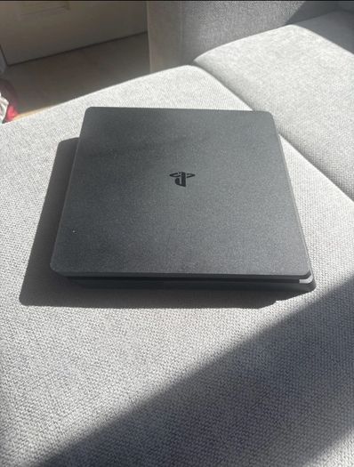 PS4 SILM With One Click Controller Brand New Condition .( Barely Uses ).  1x Console  1x Controller  1x Power Cable