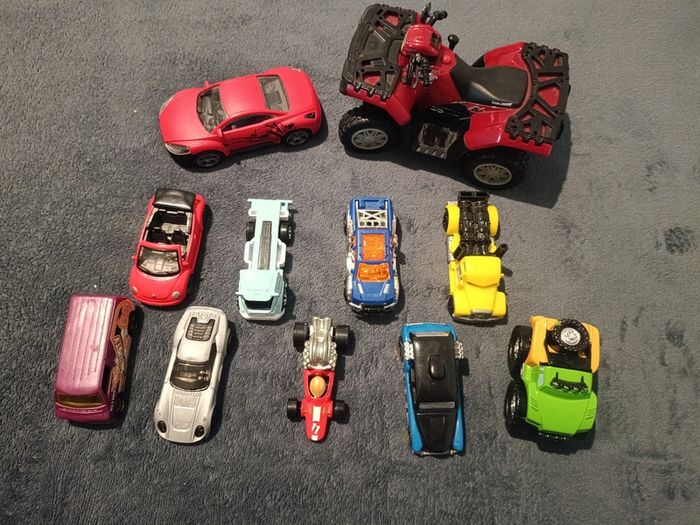 Bundle of assorted die-cast toy cars and quad bike
