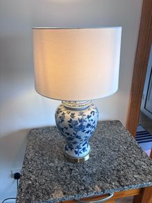Blue and white ceramic lamp, aisian flower design.