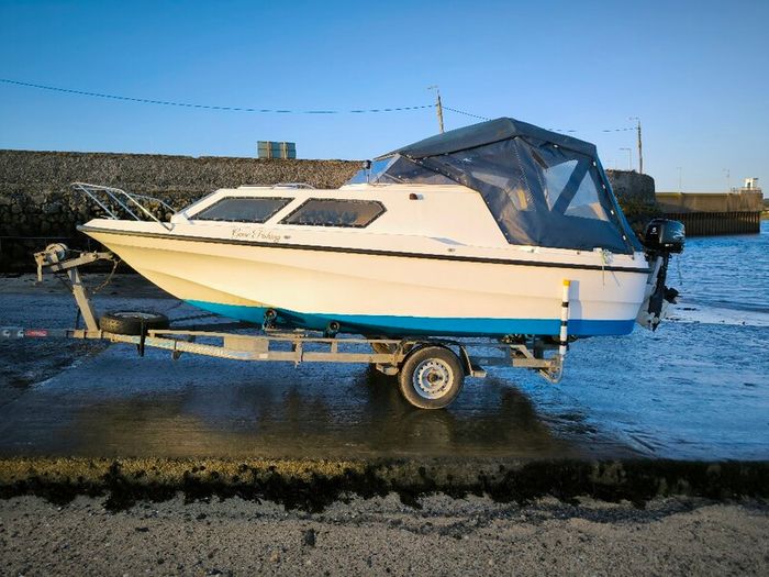 Boat Johnson 90 hp with trailer