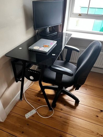 Office desk with rolling chair