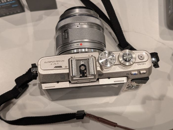 Olympus PEN Lite E-PL7 with 14-42mm lens and accessories