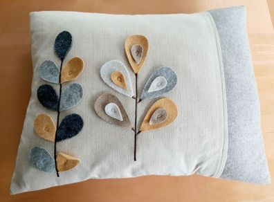 Leaf stem motif cushion