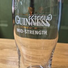 Guinness mid-strength pint glasses