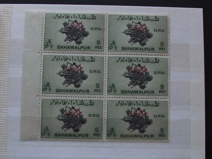 A extensive collection of Stamps from Indian States, presented in the album
