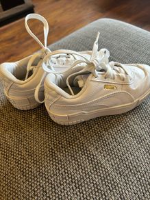 Unisex UK 12 white Puma trainers