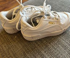 Unisex UK 12 white Puma trainers