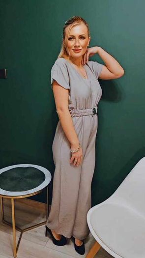 Jumpsuit with a decorative belt and tied back
