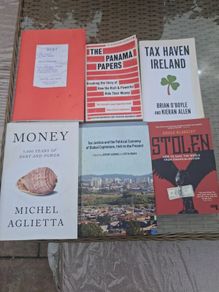 Six non fiction books on money and financial issues from progressive authors