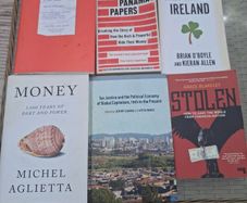Six non fiction books on money and financial issues from progressive authors