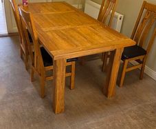 Solid Oak table and 6 chairs
