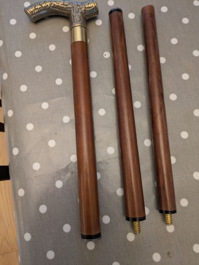 Collapsible wooden walking stick with decorative handle