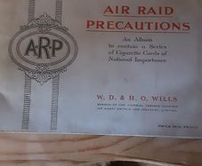militaria??:ARP cigarette card book