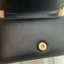 Black quilted flap shoulder bag with gold hardware Image 5