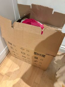 Box of clothing, shoes, bags