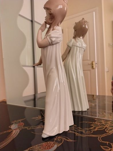 Nao by Lladro.  Yawning Girl. Damaged.