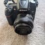 Nikon D7000 DSLR + Nikon 50mm f/1.8G + Tamron 18-200mm + Tripod + Camera Bag Image 2