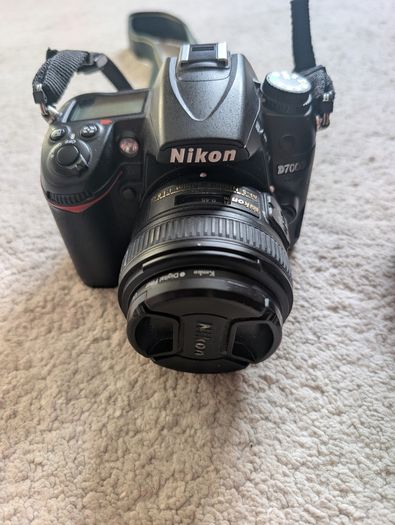 Nikon D7000 DSLR + Nikon 50mm f/1.8G + Tamron 18-200mm + Tripod + Camera Bag